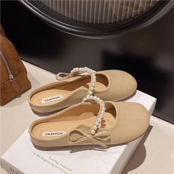 my-11134207-820lc-mpalenab3w1uba.webp Beige Pearl Bow Flat Mules